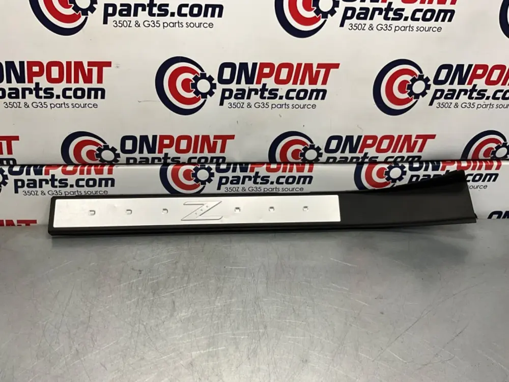 2006 Nissan Z33 350Z Driver Left Door Threshold Kick Plate OEM 23BJJE7